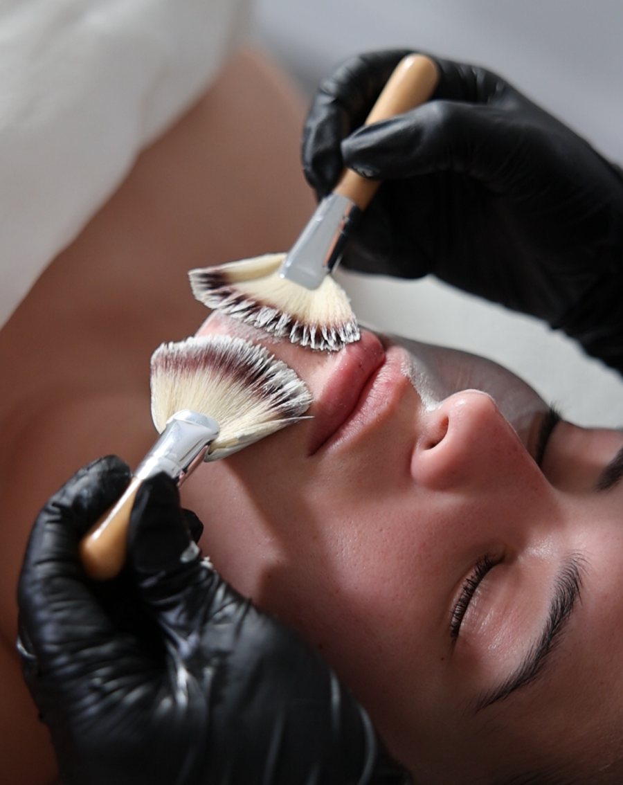 Enzyme masque applied with fan brushes