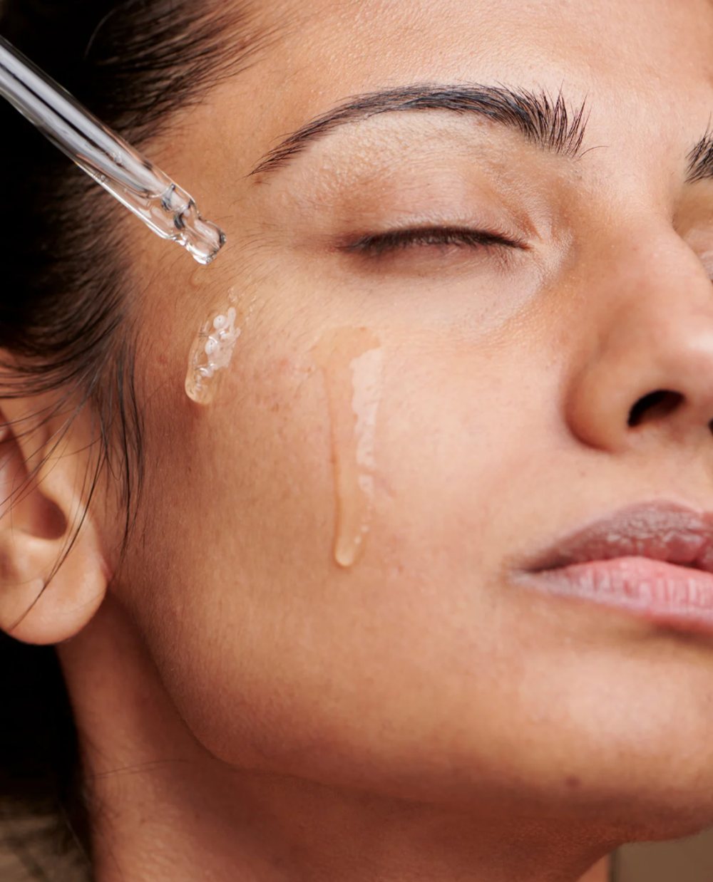 Serum applied to skin with a dropper