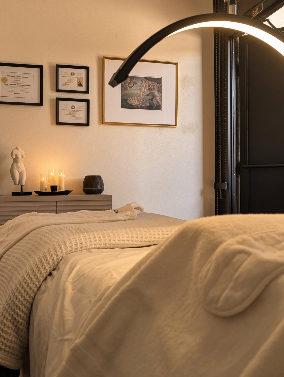 Treatment room at DARA Skin Revision, warm low light